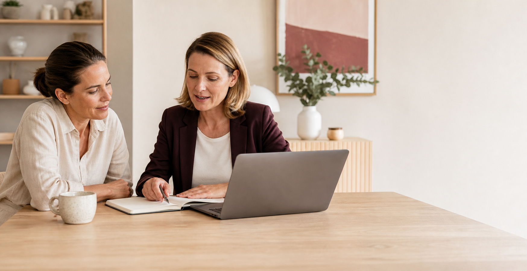 A woman discussing her property finance strategy with an adviser